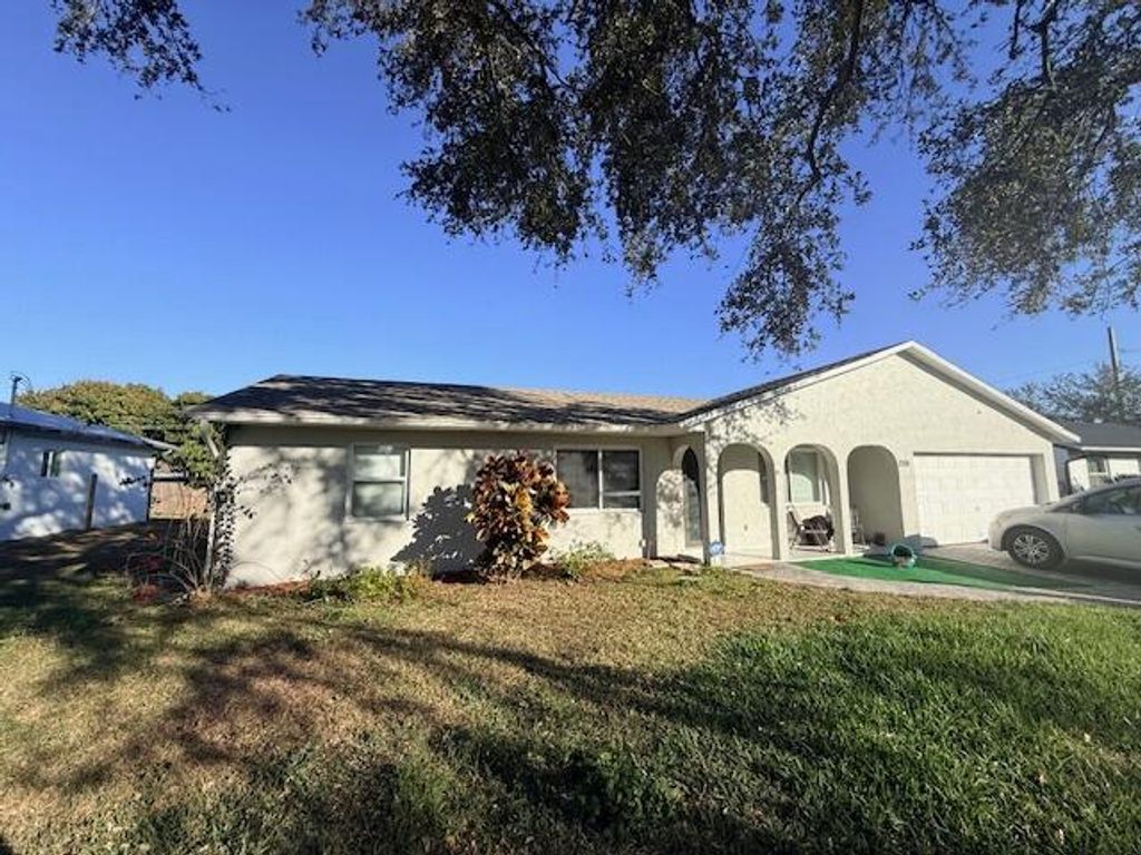 Photo of 2281 SE Belvedere Street, Port Saint Lucie, FL 34984 (MLS # R11160365)