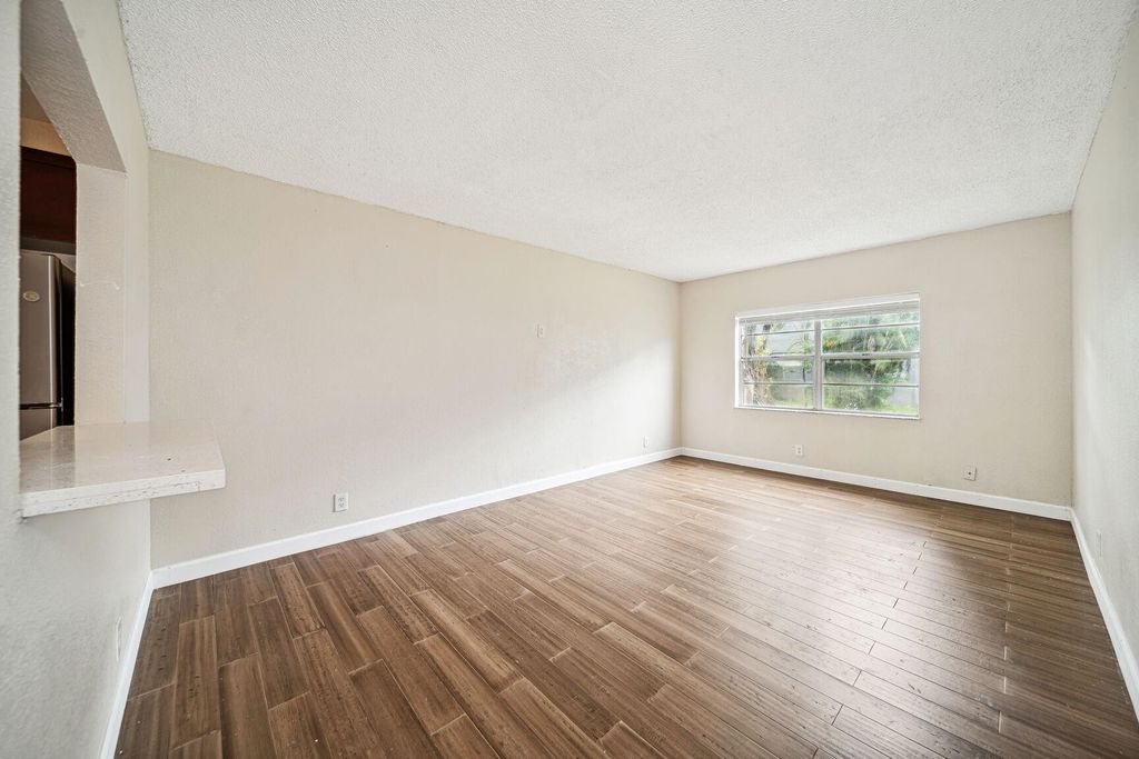 Photo of 4845 NW 9th Drive #4845, Fort Lauderdale, FL 33317 (MLS # F10461550)