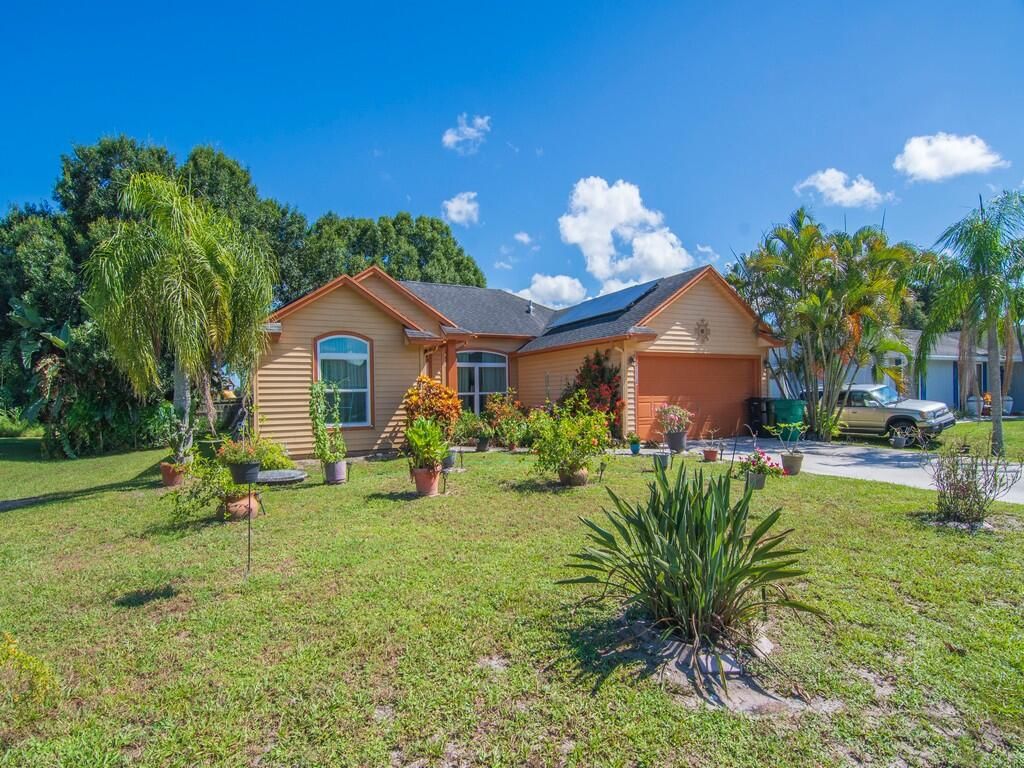 Photo of 714 SW Andrew Road, Port Saint Lucie, FL 34953 (MLS # R11115367)