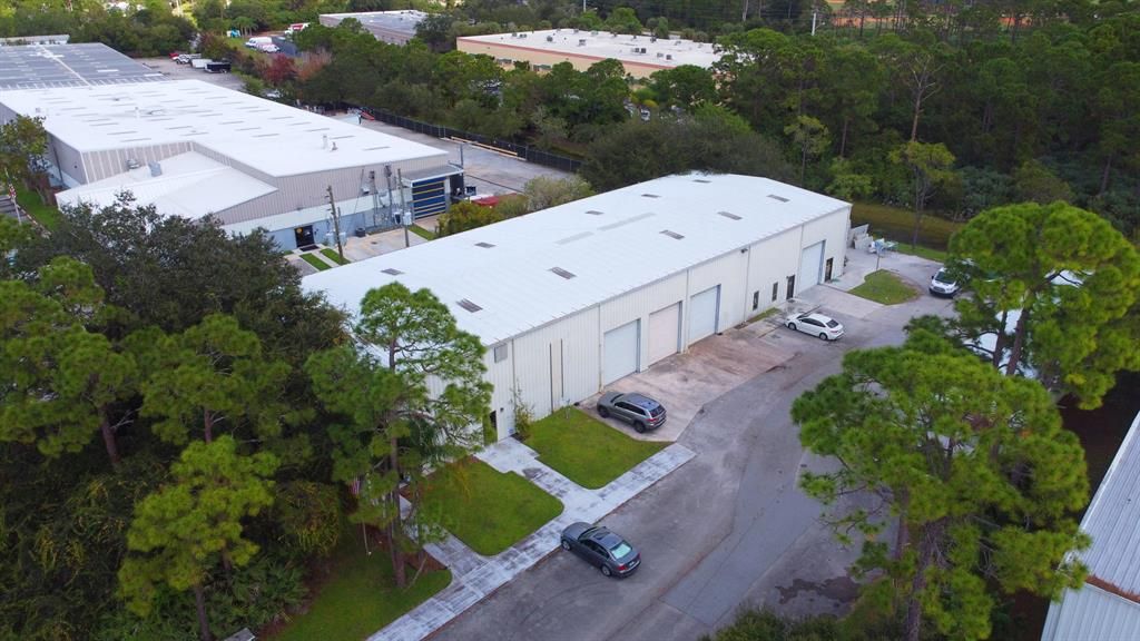 Photo of 475 NW Enterprise Drive, Saint Lucie West, FL 34986 (MLS # R10677286)