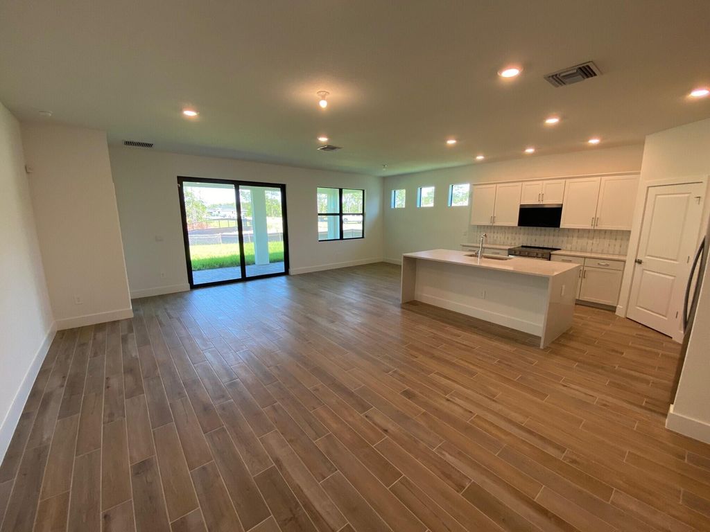 Photo of 7111 SE Park Trace Court, Stuart, FL 34997 (MLS # R10958488)