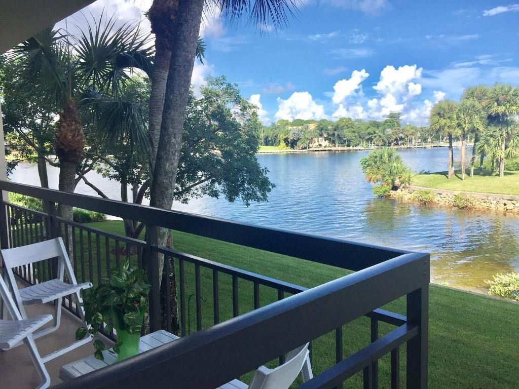 Photo of 1801 Marina Isle Way #202, Jupiter, FL 33477 (MLS # R10956752)