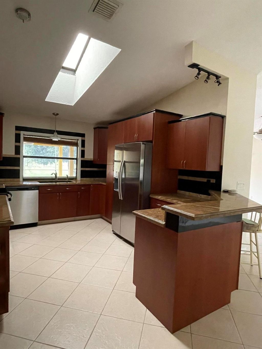 Photo of 1566 SE Cutorro Avenue, Port Saint Lucie, FL 34952 (MLS # R10949847)