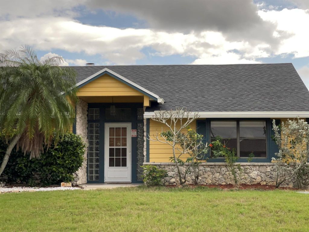 Photo of 1566 SE Cutorro Avenue, Port Saint Lucie, FL 34952 (MLS # R10949847)