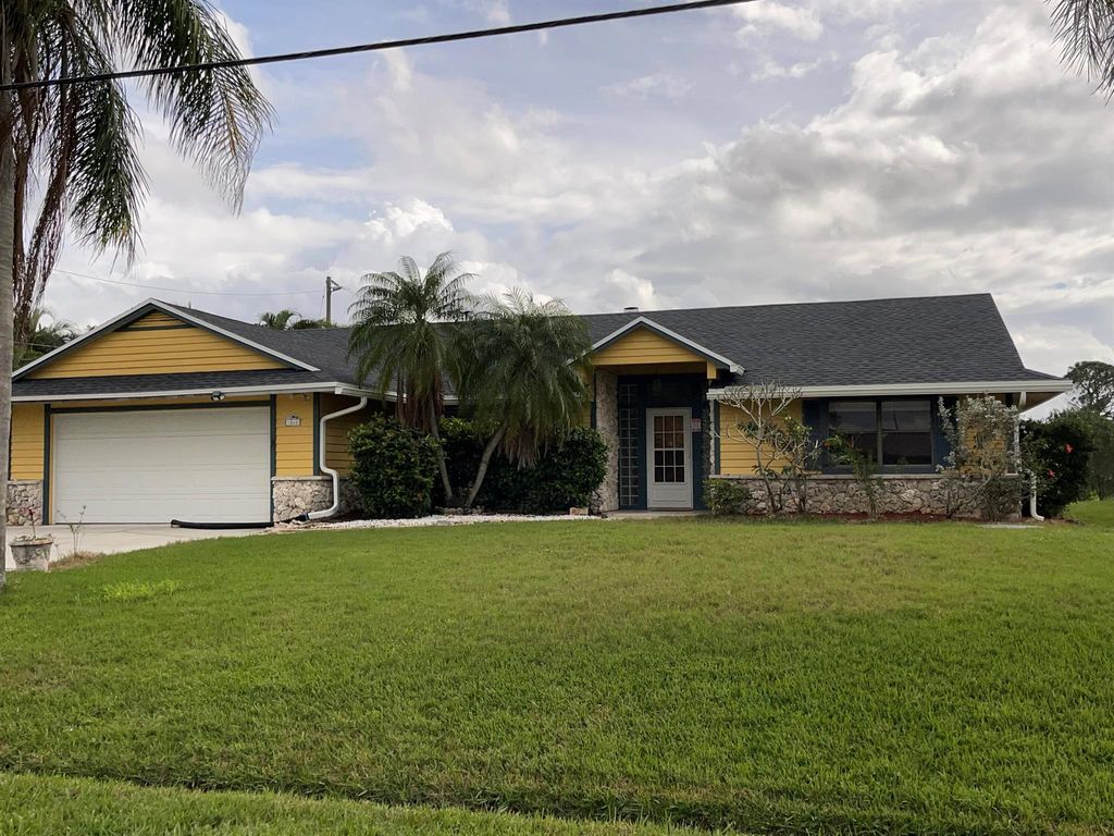 Photo of 1566 SE Cutorro Avenue, Port Saint Lucie, FL 34952 (MLS # R10949847)