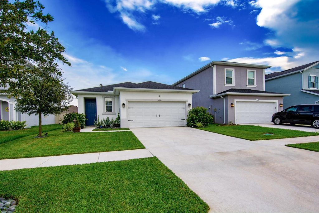 Photo of 10885 SW Robbia Way, Port St Lucie, FL 34987 (MLS # R11014060)