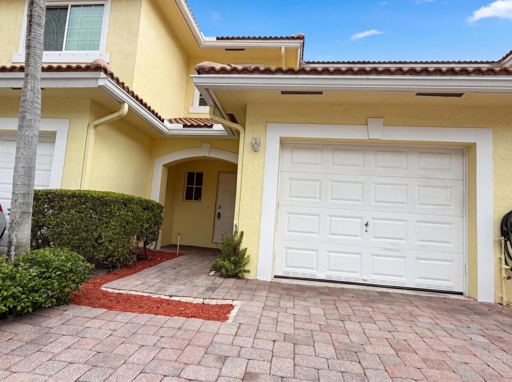 Photo of 917 Imperial Lake Road, West Palm Beach, FL 33413 (MLS # B26020513)