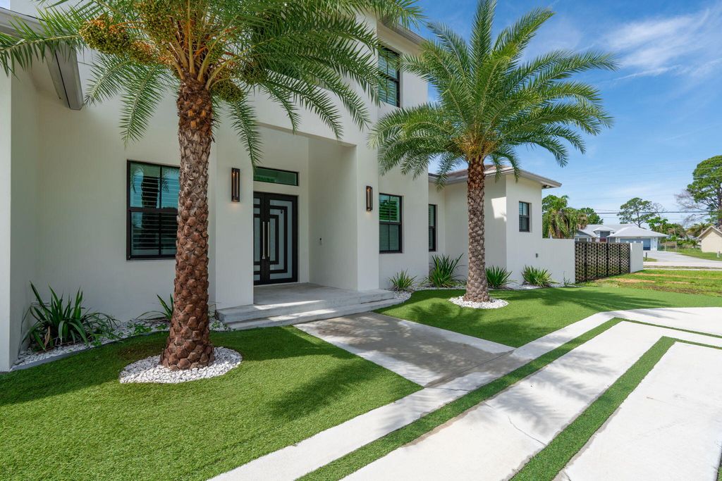 Photo of 298 SW Statler Avenue, Port Saint Lucie, FL 34984 (MLS # B26025687)