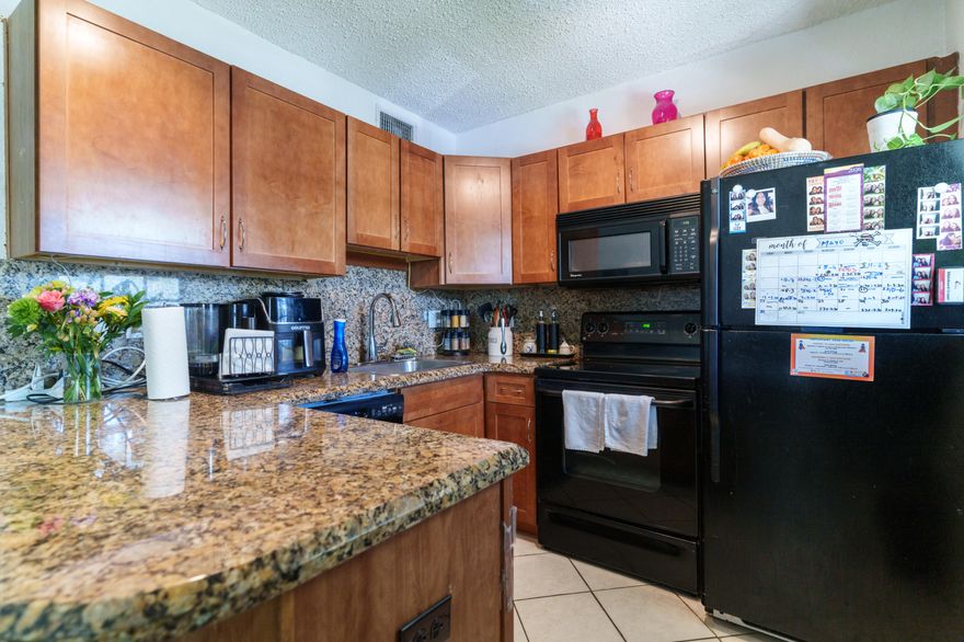 Updated 2BR/1BA condo in The Grove at Wilton Manors featuring impact windows, tile floors, remodeled kitchen and bath with granite countertops and wood cabinets, A/C replaced in 2025 with a 2-ton Trane system, and tasteful modern finishes throughout. First-floor unit in a well-maintained Gated Community with immediate rental eligibility and a pet-friendly community. Excellent location near Wilton Drive dining, entertainment, shopping, beaches, and downtown Fort Lauderdale