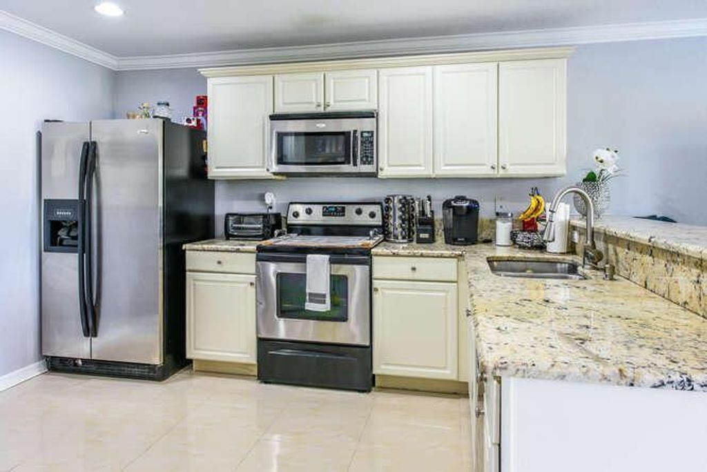 Photo of 2231 SW Portsmouth Lane, Port Saint Lucie, FL 34953 (MLS # R10970918)