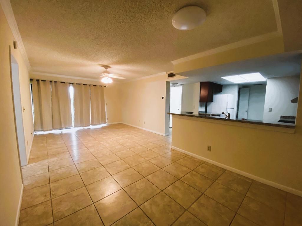 Photo of 9022 W Atlantic Boulevard #214, Coral Springs, FL 33071 (MLS # R11158090)