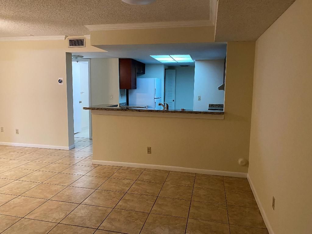 Photo of 9022 W Atlantic Boulevard #214, Coral Springs, FL 33071 (MLS # R11158090)