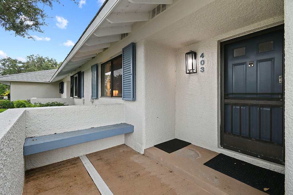 Photo of 403 Club Drive, Palm Beach Gardens, FL 33418 (MLS # R10983138)