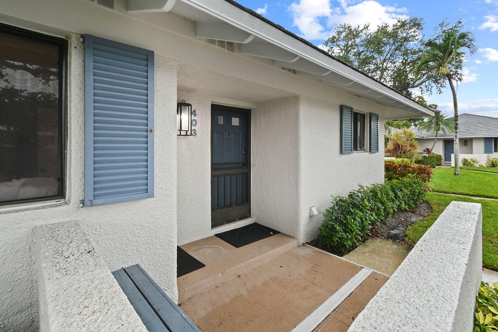 Photo of 403 Club Drive, Palm Beach Gardens, FL 33418 (MLS # R10983138)