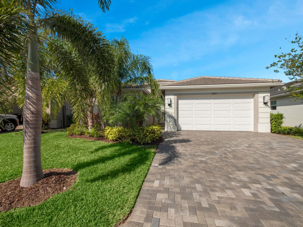 Photo of 10949 SW Sunray Street, Port Saint Lucie, FL 34987 (MLS # R10920558)