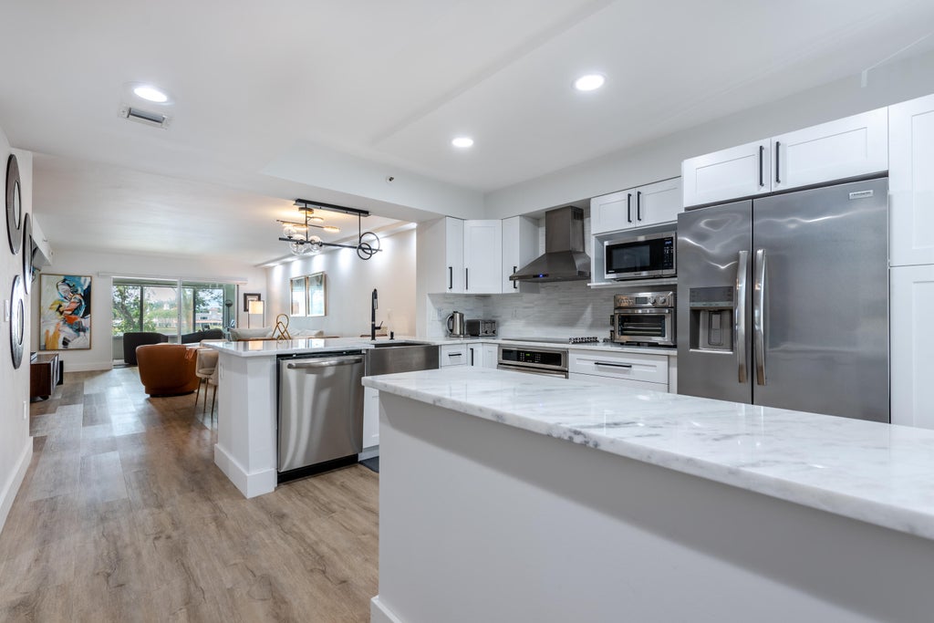 Photo of 6096 Huntwick Terrace #303, Delray Beach, FL 33484 (MLS # R11099837)