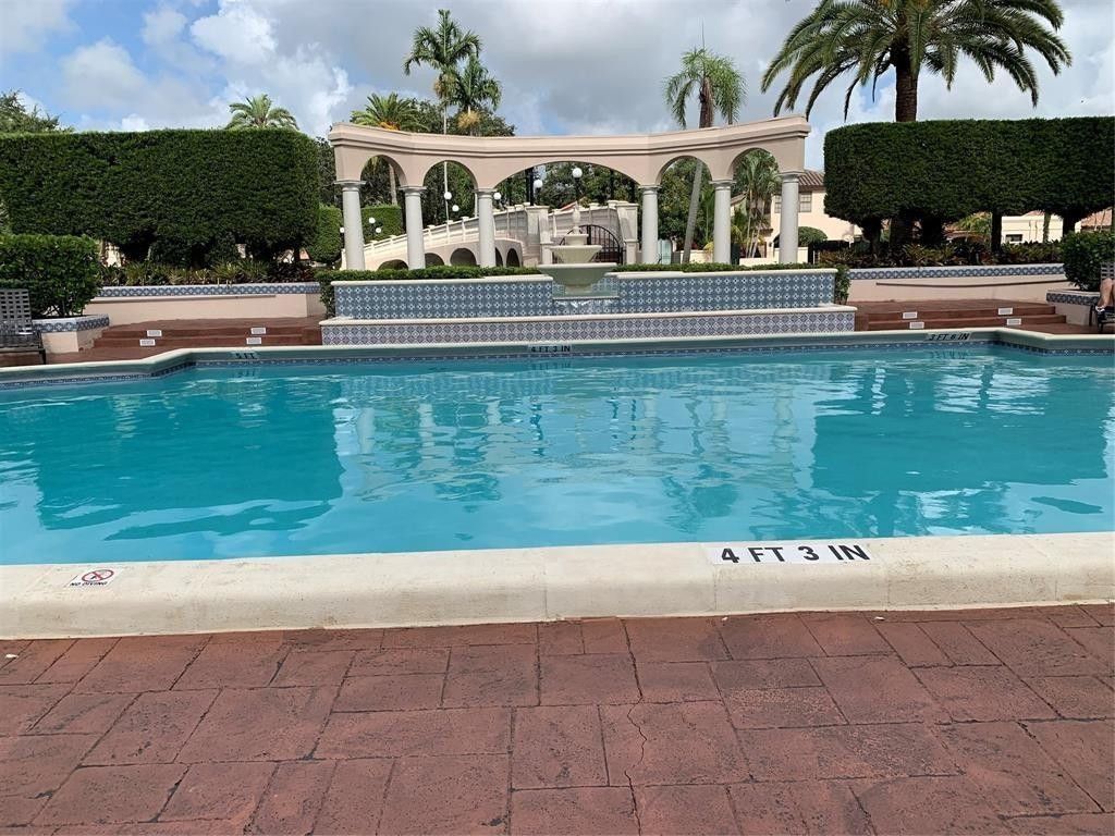 Photo of 623 Deer Creek Viaduct #623, Deerfield Beach, FL 33442 (MLS # F10542872)