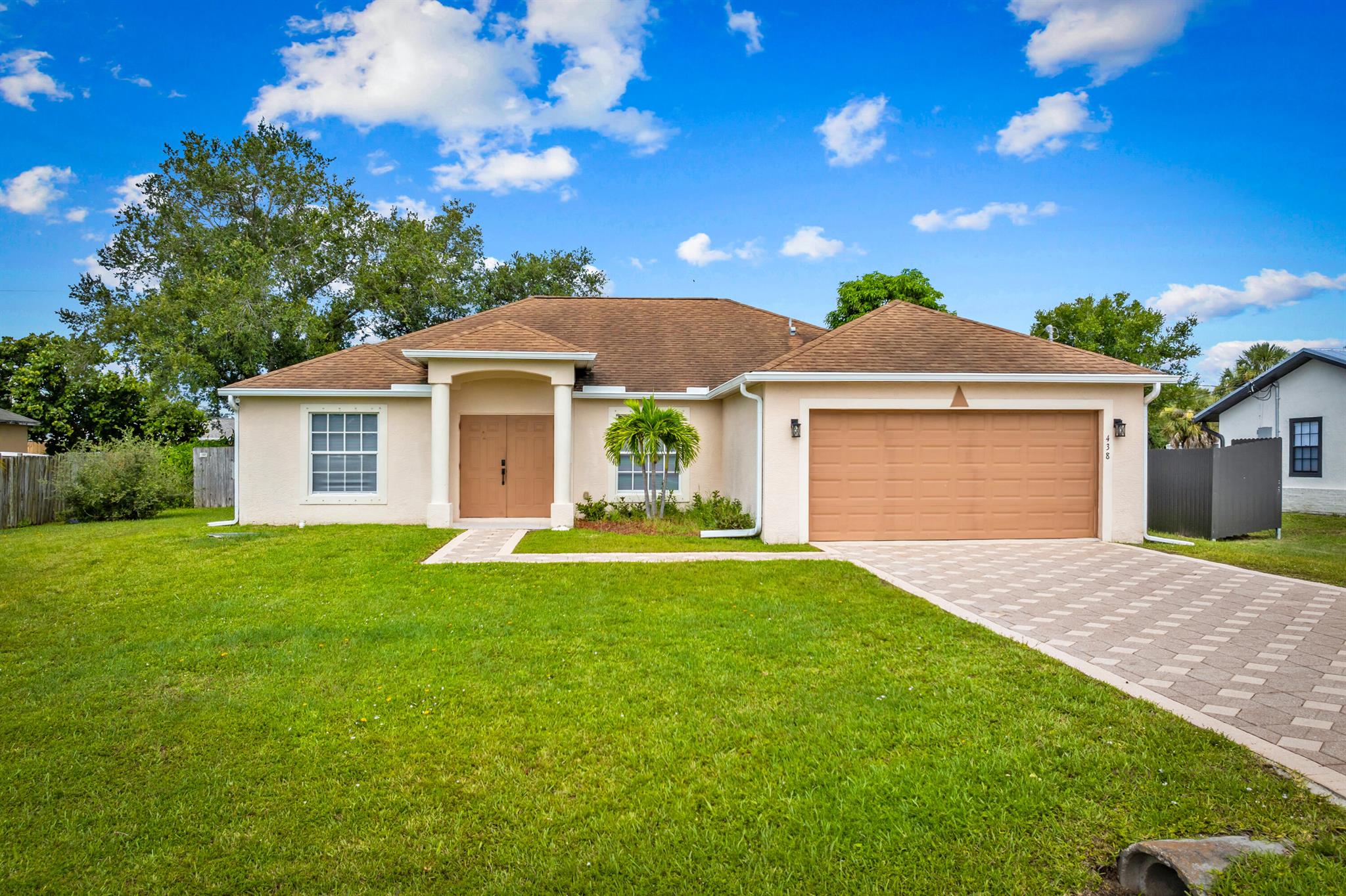 3/2/2 CBS home with lake view located in sunny Port Saint Lucie Florida. The large split bedroom open floor plan with vaulted ceilings are complemented by a spacious kitchen with granite countertops and stainless steel appliances, shady fenced back yard and screen in porch, all within a sort drive from endless shopping and beaches. Schedule a showing today.