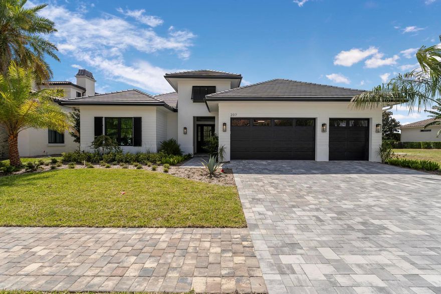 Experience the pinnacle of luxurious living with the newly constructed Augusta Custom Pool Home by Ecclestone Signature Homes. This exquisite coastal modern residence offers breathtaking water views and is located within the highly sought-after Tesoro Club, a prestigious gated golf community. This expansive one-story home features four bedrooms and 4.5 baths, complemented by a wet bar and a walk-in pantry.The open floor plan is perfectly designed for both relaxation and entertaining. The gourmet kitchen is a chef's dream, featuring high-end Thermador appliances, a generous center island with back-to-back cabinetry, elegant quartz countertops, a full backsplash, and stunning cabinetry. Numerous upgrades are included, with project completion anticipated in early spring 2025.