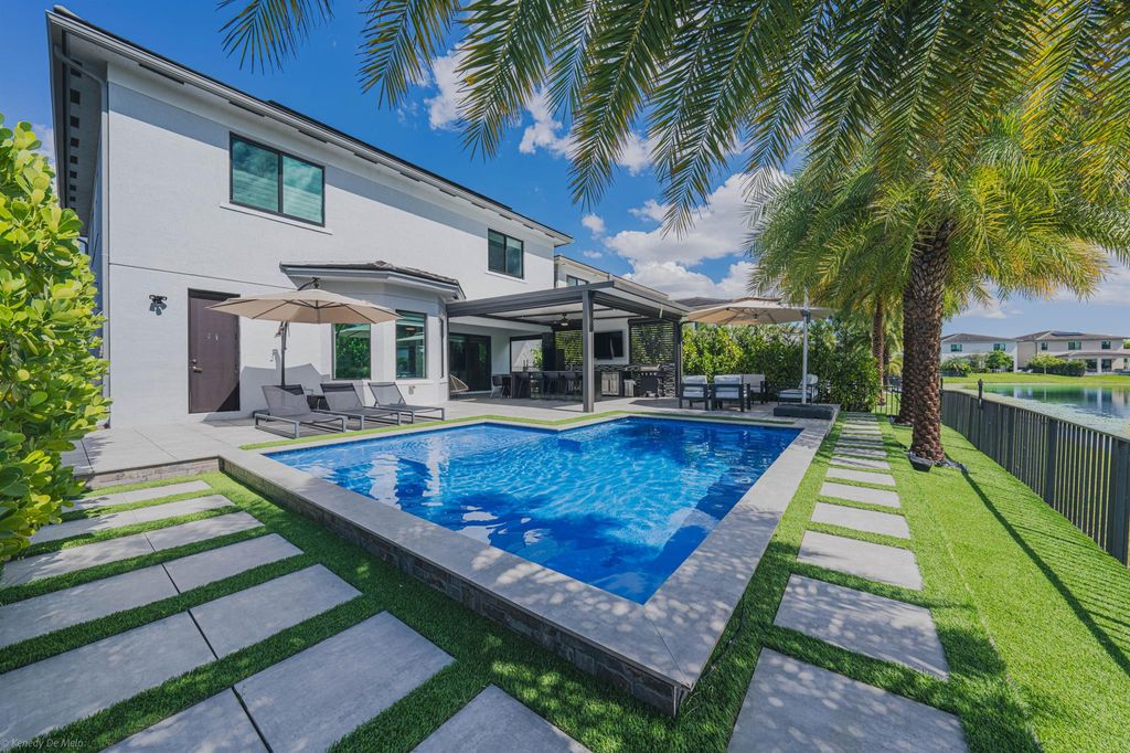 Photo of 10826 Oceano Way, Parkland, FL 33076 (MLS # R11132862)