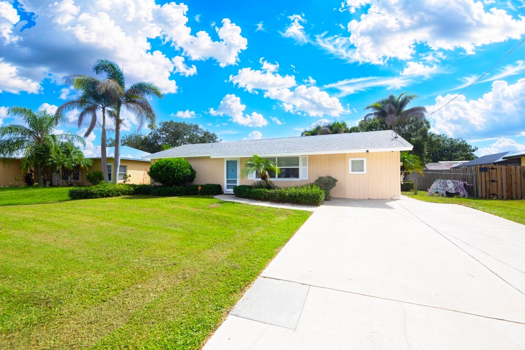 Photo of 6004 Tangelo Drive, Fort Pierce, FL 34982 (MLS # B26075432)