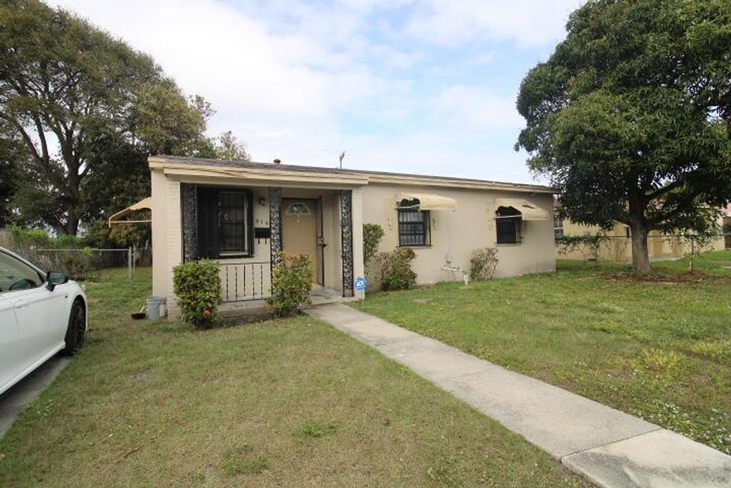 Photo of 376 W 15th Street, Riviera Beach, FL 33404 (MLS # R11063738)