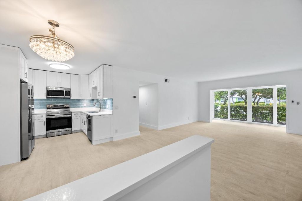 Photo of 315 Venetian Drive #4, Delray Beach, FL 33483 (MLS # R11120757)