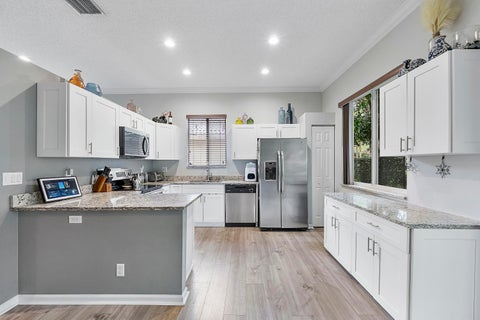 Tiny photo for 5024 Ibis Court, Coconut Creek, FL 33073 (MLS # B26034164)