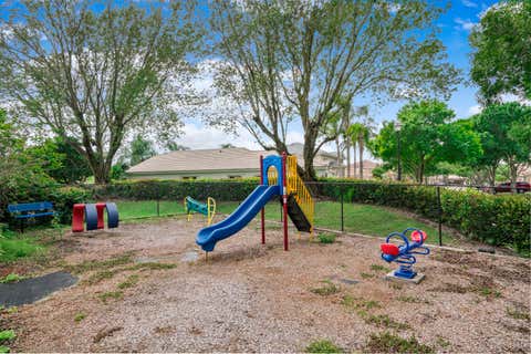 Tiny photo for 5024 Ibis Court, Coconut Creek, FL 33073 (MLS # B26034164)