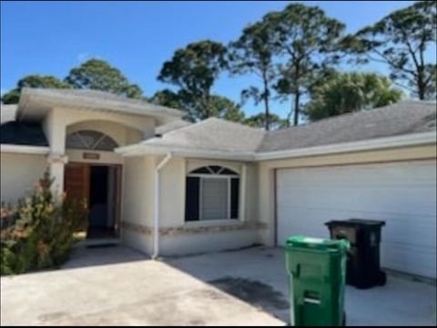 Photo of 1833 SW Bellevue Avenue, Port St Lucie, FL 34953 (MLS # R11135890)