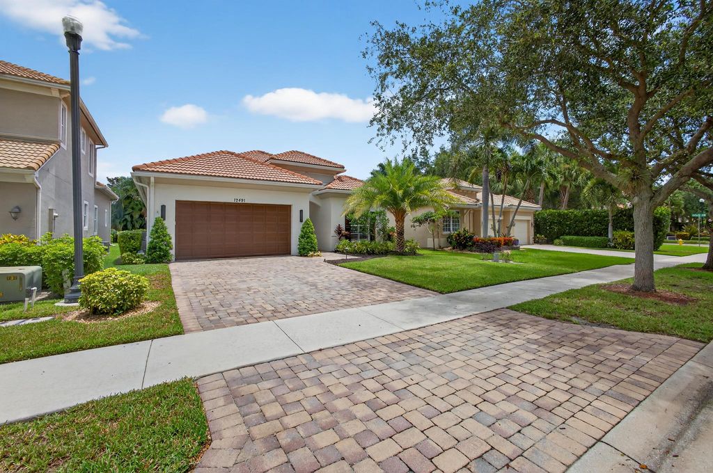 Photo of 12491 Aviles Circle, Palm Beach Gardens, FL 33418 (MLS # R11103062)