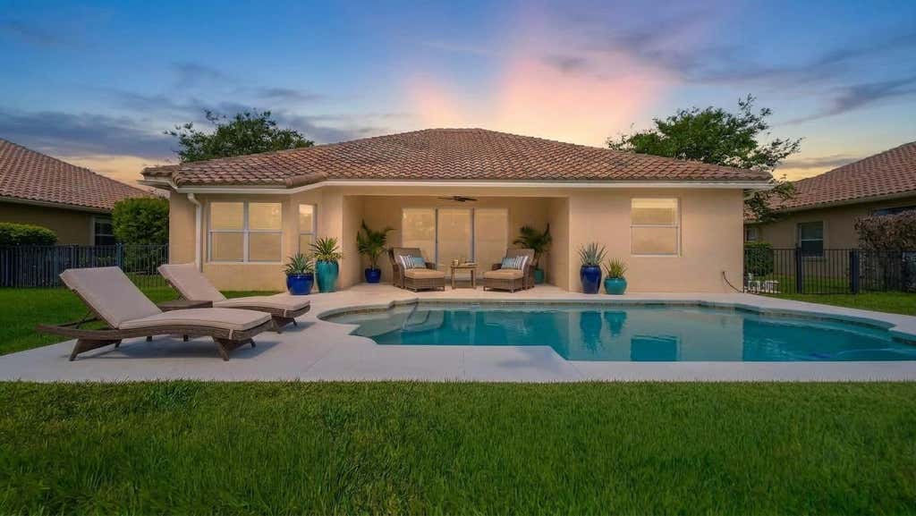 Photo of 7677 Fieldstone Ranch Square, Vero Beach, FL 32967 (MLS # B26044624)