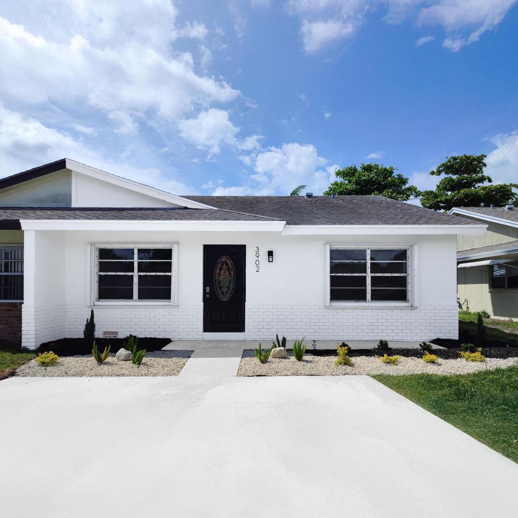 Photo of 3902 Harwood Street, West Palm Beach, FL 33403 (MLS # B26018786)