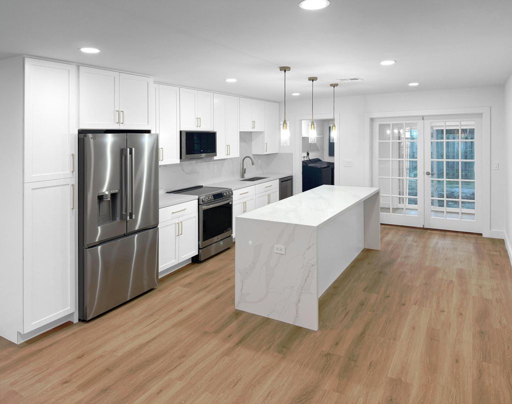 Photo of 3902 Harwood Street, West Palm Beach, FL 33403 (MLS # B26018786)