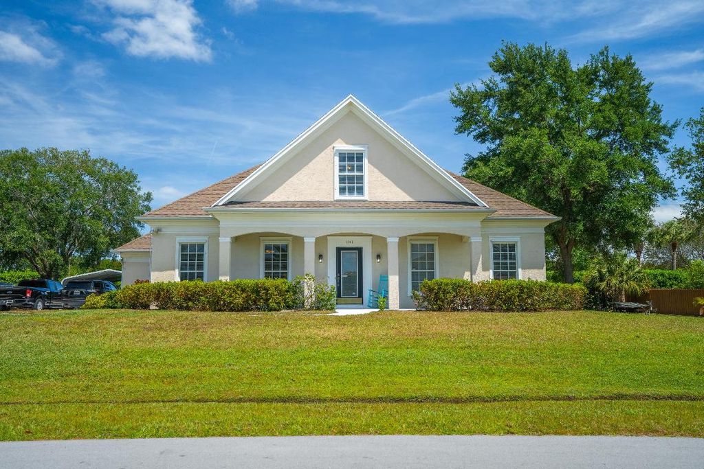 Photo of 1641 SW Janette Avenue, Port Saint Lucie, FL 34953 (MLS # R10980035)