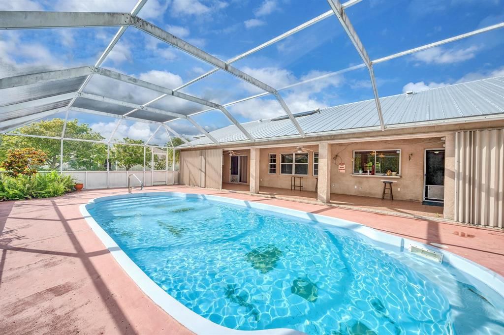 Photo of 1732 SW Lexington Drive NE, Port St Lucie, FL 34953 (MLS # R10876675)