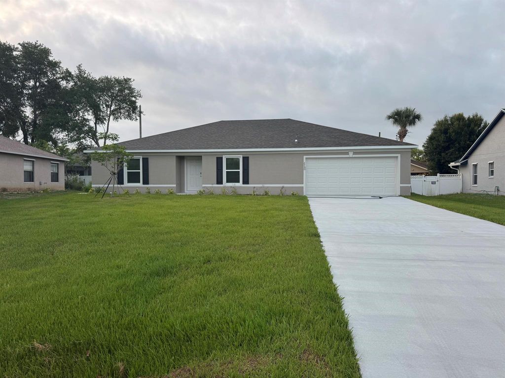Photo of 2790 SW District Avenue, Port Saint Lucie, FL 34953 (MLS # R11085460)