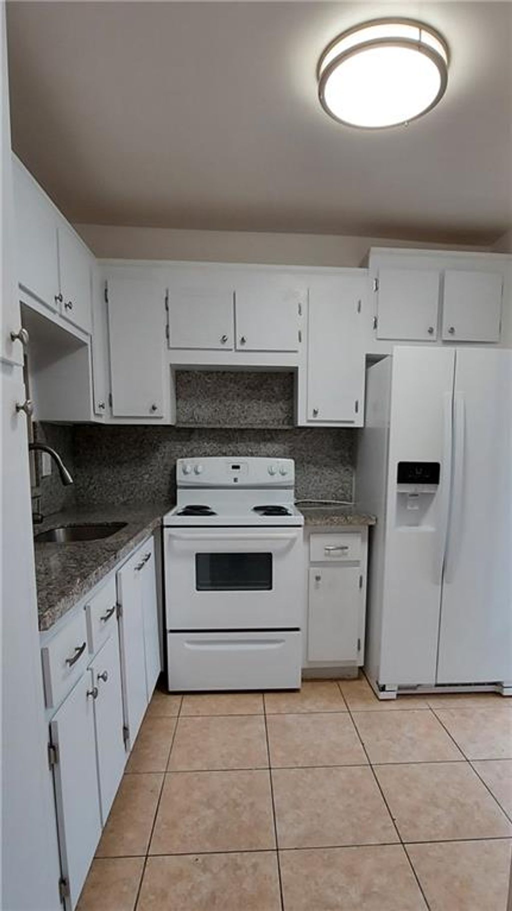 Photo of 218 NE 12th Ave #105, Hallandale Beach, FL 33009 (MLS # F10300169)