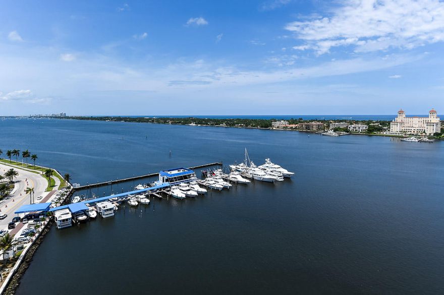 Experience magnificence in this luxurious home, only one of two duplex penthouse residences at prestigious One Watermark. It boasts unparalleled ocean and lake views with walls of glass and multiple private terraces! The entry foyer accessed through a personal elevator leads to a magnificent living/entertaining space featuring soaring 20’ ceilings and a sweeping staircase. Well scaled with quality details and finishes, you will revel in its stunning marble floors, deep moldings, gourmet kitchen, rich paneled library, family room, gym, custom closets, private, oversized A/C 3 car garage and much more. This is a rare and outstanding buying opportunity in the most coveted full service, concierge building. Move in NOW and begin enjoying immediately!