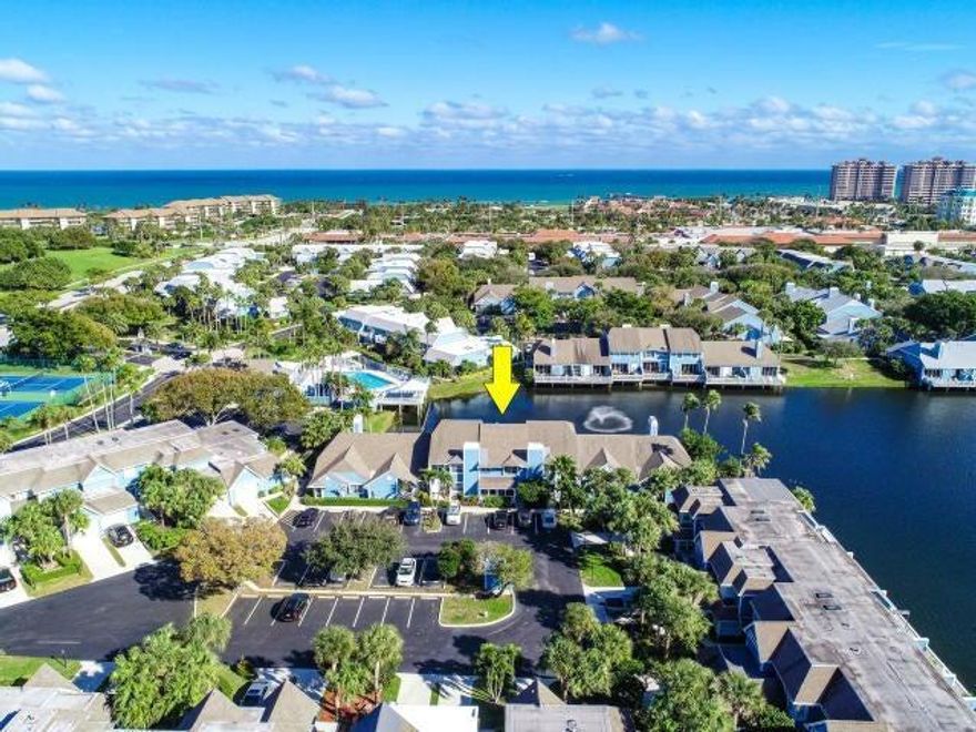 Newly renovated Townhouse overlooking the lake at Villas of Ocean Dunes in Jupiter Florida. Only a 5 minute walk to shopping, Jupiter Beach, and the Jupiter Beach Pier. ceramic tile on first floor, hardwood floors upstairs. Newly furnishet throughout. Two Master suites, upgraded kitchen and huge deck in lake for awesome sunset views and grilling. Gated communnity for extra Security. A must see!