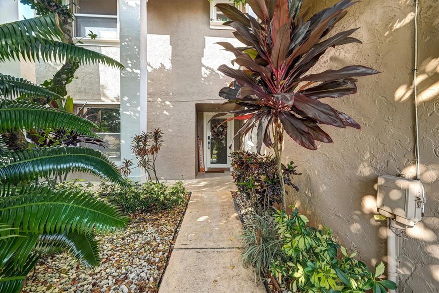 Welcome to this fully upgraded 4-bed, 2.5-bath single family home in the heart of Plantation, tucked in a quiet cul-de-sac. Enjoy a modern kitchen with touchscreen refrigerator, Calacatta marble waterfall countertops, stainless steel appliances, and new washer/dryer. Elegant wood floors, glass staircase, crown molding, and dimmable LED lighting add contemporary style. The private backyard oasis features a spacious deck, synthetic grass, and sparkling pool—perfect for relaxing or entertaining. Two-car garage with optional gym, premium water filtration, and fully furnished option available. Located in a safe, family-friendly neighborhood near shopping, dining, and major roads.