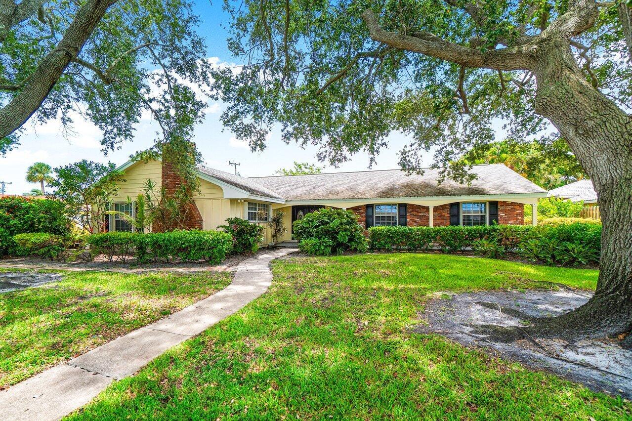 Nestled in the sought-after Tequesta area, this inviting 3-bedroom pool home offers comfort, space, and timeless Florida charm. Set on a quiet, private street, the home features over 2,000 square feet of living space with multiple living areas, an open-concept kitchen overlooking the pool, and generously sized bedrooms. The primary suite includes a spacious closet and a beautifully renovated bathroom. Step outside to a covered patio and enjoy year-round entertaining by the screened-in pool. Freshly painted interior adds a clean, updated feel throughout.