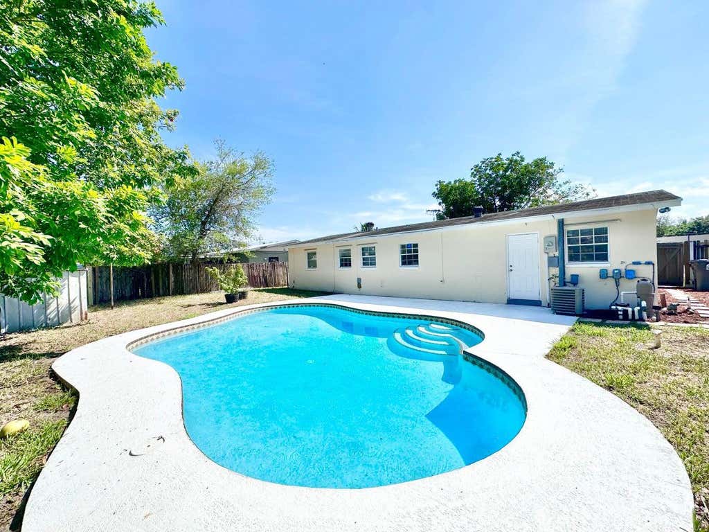 Photo of 4845 Andros Drive, West Palm Beach, FL 33407 (MLS # B26066725)