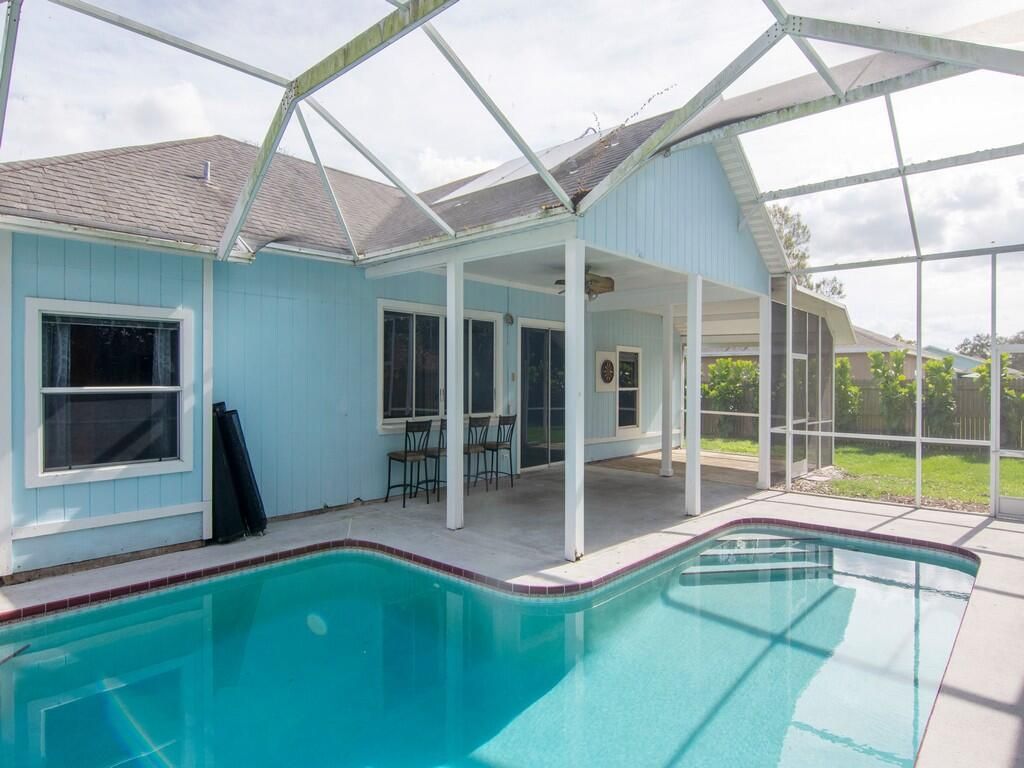 Photo of 1956 SW Aladdin Street, Port Saint Lucie, FL 34953 (MLS # R10856674)