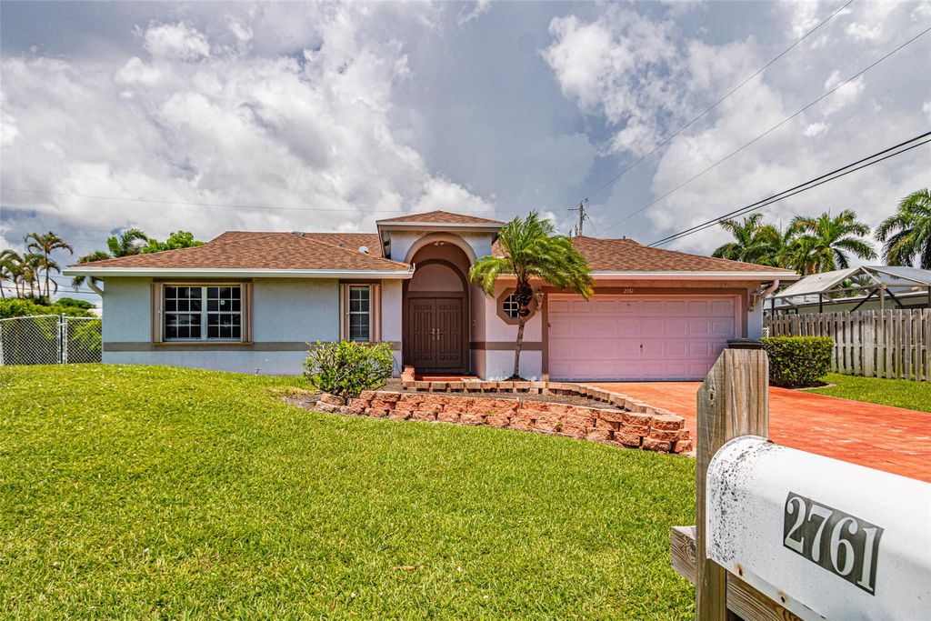 Photo of 2761 NE 27th Cir, Boca Raton, FL 33431 (MLS # F10394326)