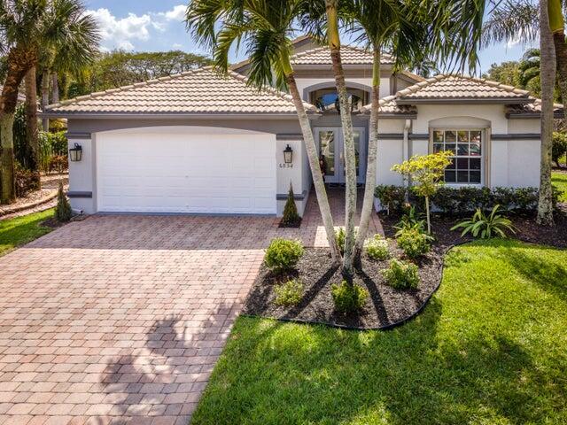 Charming lakefront three-bedroom two bath house in beautiful Bellaggio. The house has been tastefully remodeled with upgraded appliances, custom blinds, and gorgeous fixtures to compliment the 12-foot ceilings.3 ft. wide doors throughout the house to make it handicap and wheelchair accessible.Enjoy the safety of the custom double impact glass doors in the front and back. along with the easy built in hurricane shutters. Use the third bedroom for a guest room, office, or den with its built-in safe closet, and desk.Entertain on your beautiful screened in lanai overlooking the lake.Bellagio has first class amenities, offering indoor, outdoor pools, sauna, cafe, shows and more. Make new friends at all the classes they offer. Enjoy this country club lifestyle at your new home