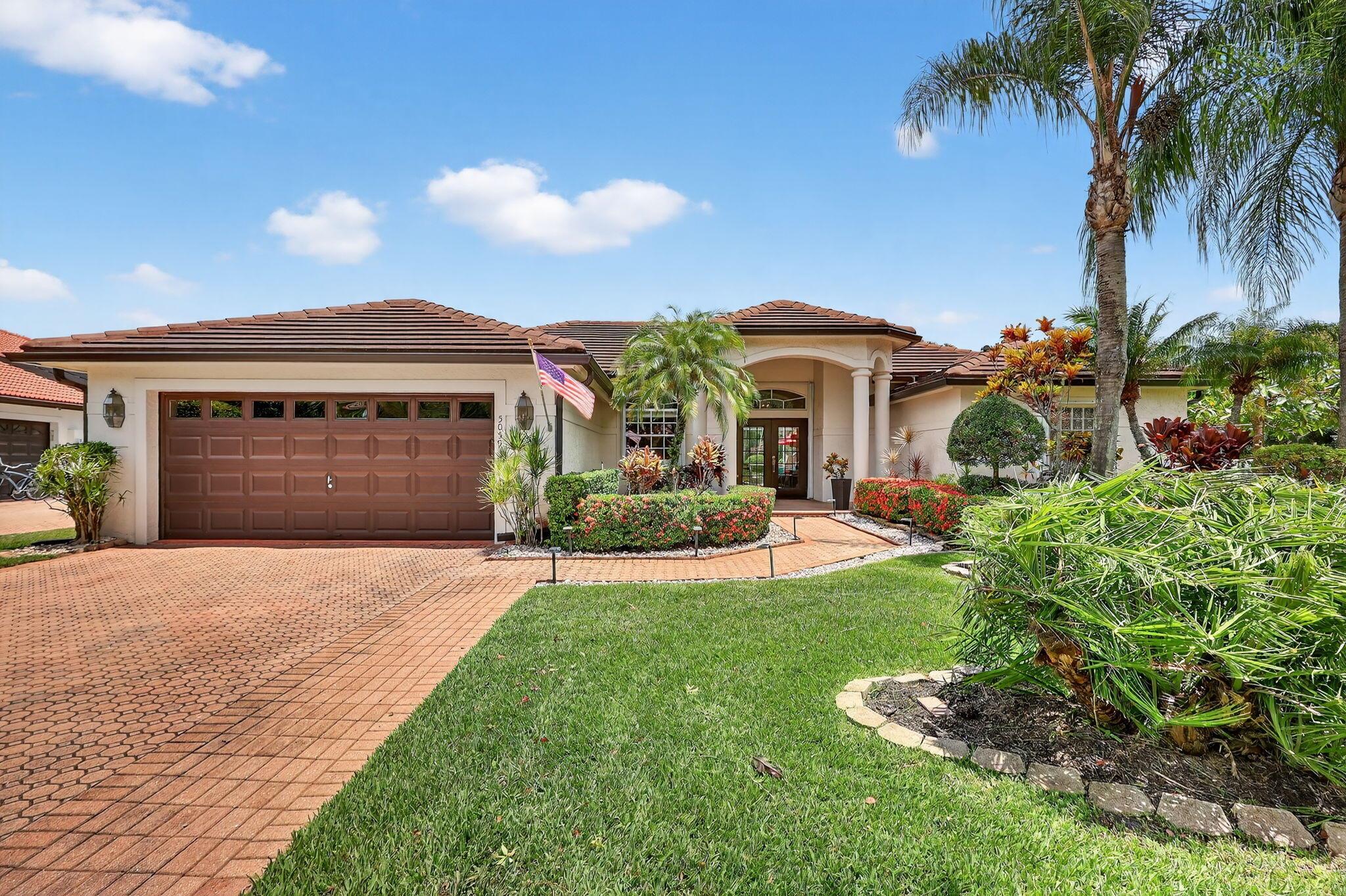 This is the ONE! Elegant and spacious, this 4 bedroom, 3 full bathroom, one story pool home sits on an oversized 1/3 + acre lot with a sparkling salt water pool and spa, large screened in patio that backs to the 18th fairway of Hammock Creek Golf course. It features a newer roof (2020), accordion shutters, exquisitely renovated open kitchen (2024) complete with double oven. The family room showcases a custom wall with mounted electric fireplace and TV. Luxury vinyl plank flooring throughout the main areas and bedrooms, plenty of natural light, with high end finishes. Split floorplan affords privacy, large primary bedroom and bathroom and a cabana bath. No Carpet! The Sanctuary has a private gate. Hammock Creek has no mandatory membership! Jack Nicklaus legacy design 18 hole course.