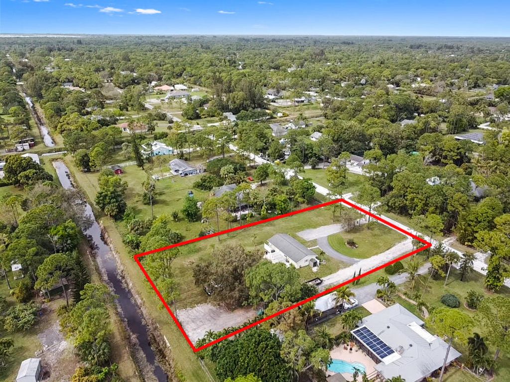 Photo of 11158 51st Court N, West Palm Beach, FL 33411 (MLS # R10960377)