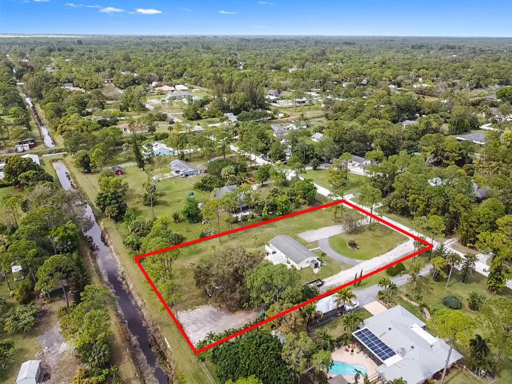 Photo of 11158 51st Court N, West Palm Beach, FL 33411 (MLS # R10960377)