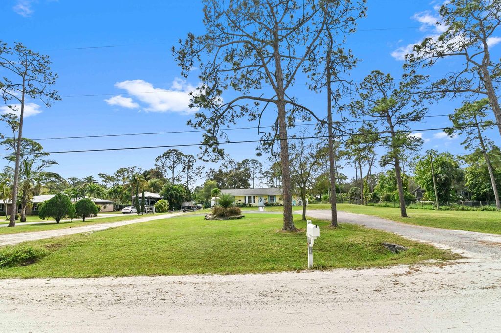 Photo of 11158 51st Court N, West Palm Beach, FL 33411 (MLS # R10960377)